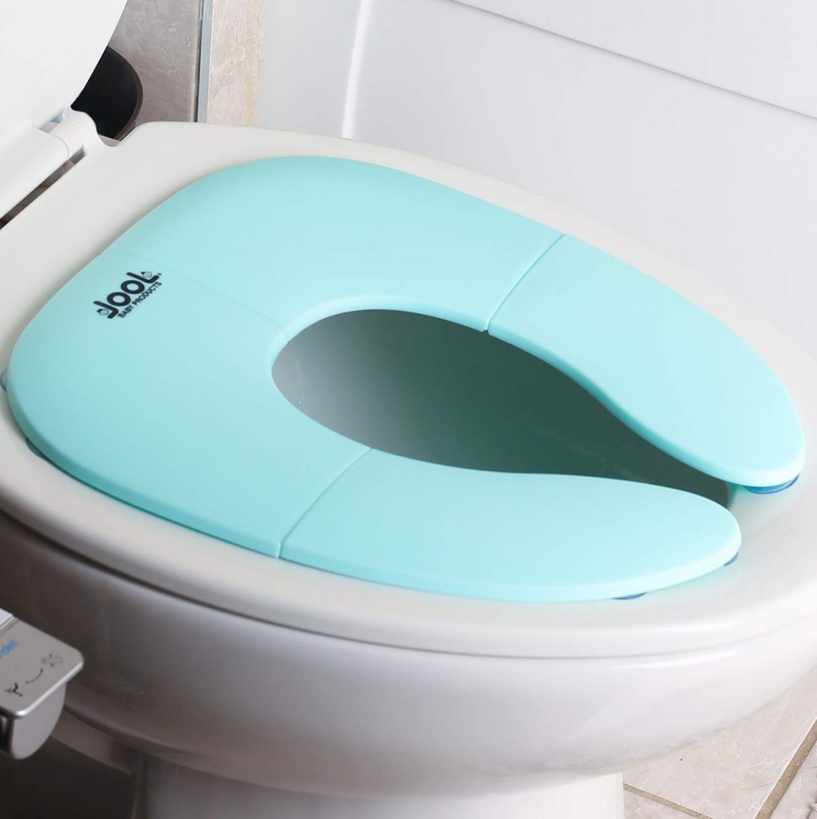 Folding potty seat